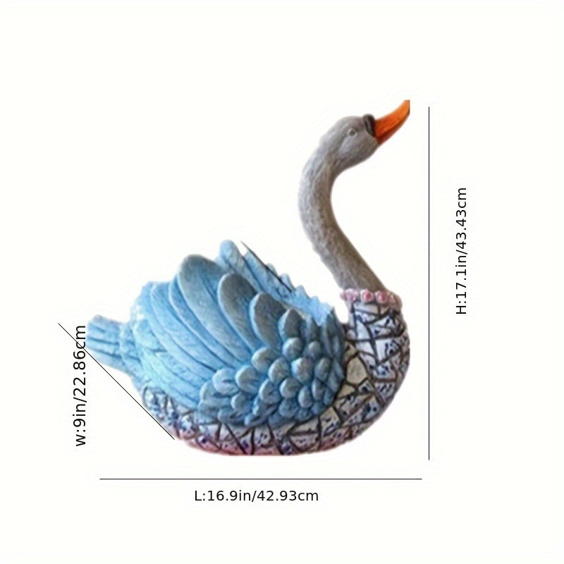 Cygne mâle regardant un pot de fleurs ornemental (sans fleurs)
