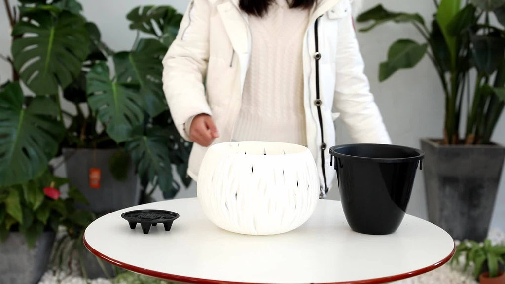 Cache-pot suspendu ajouré Ø 22 cm avec chaîne - 4 coloris