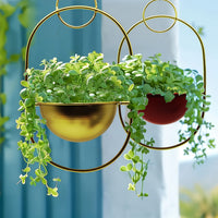 Cache-pot suspendu en métal Ø 16 cm, structure ovale design