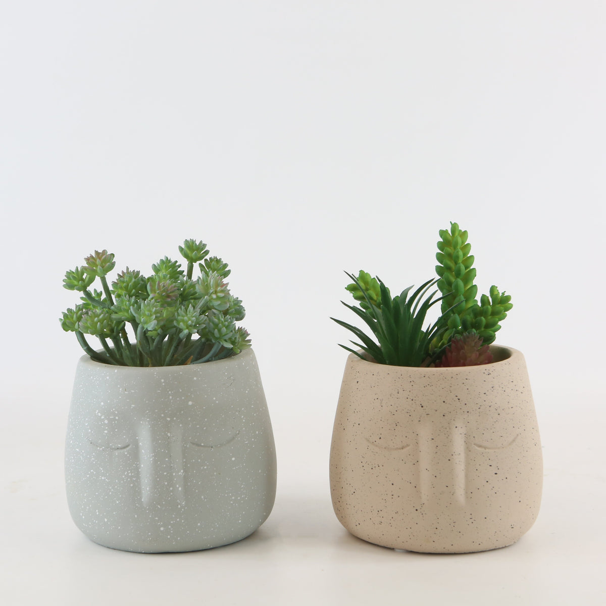 Cache-pot visage en béton Ø 11 cm, style nordique épuré