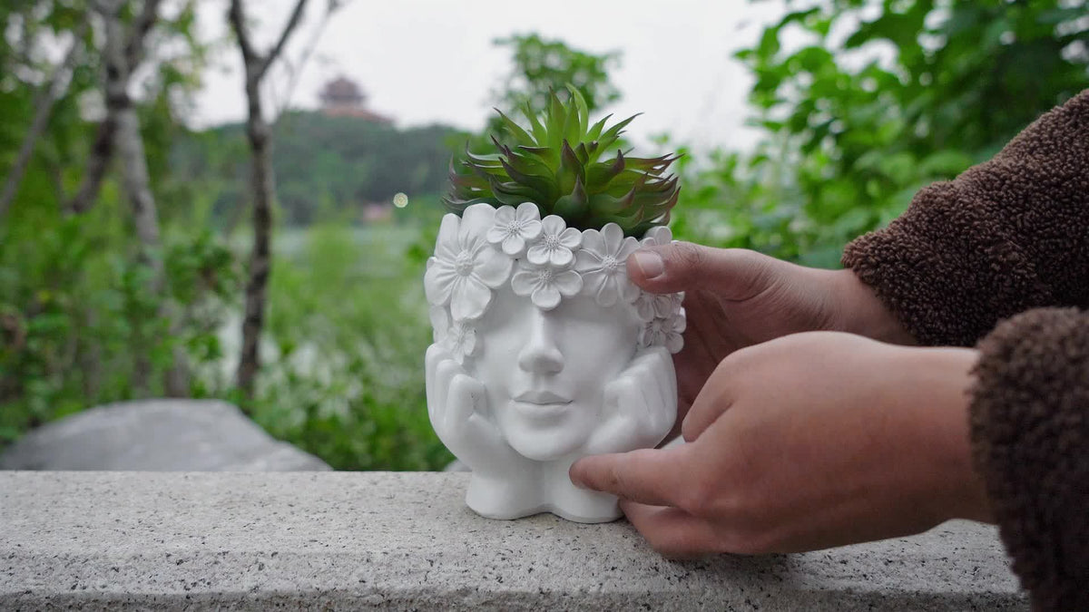 Cache-pot visage fleuri en résine Ø 14 cm pour succulentes