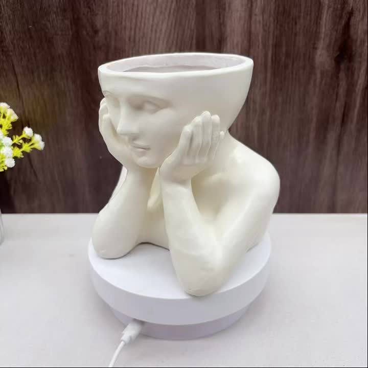 Cache-pot visage méditant en résine — petit format, 4 coloris