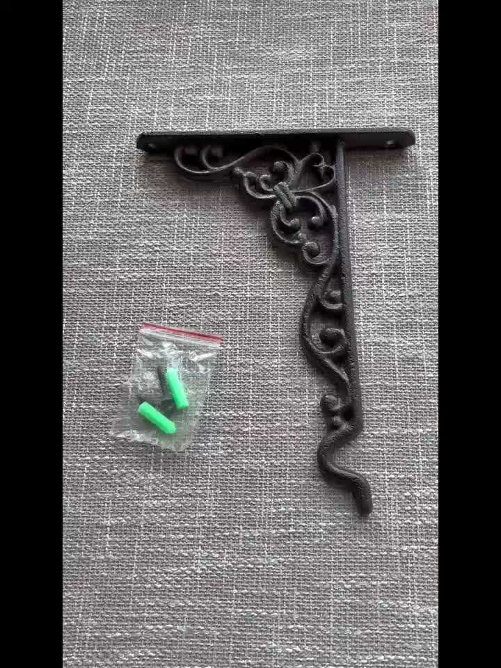 Crochet mural en fonte pour pot de fleur — 23 cm, décor ajouré