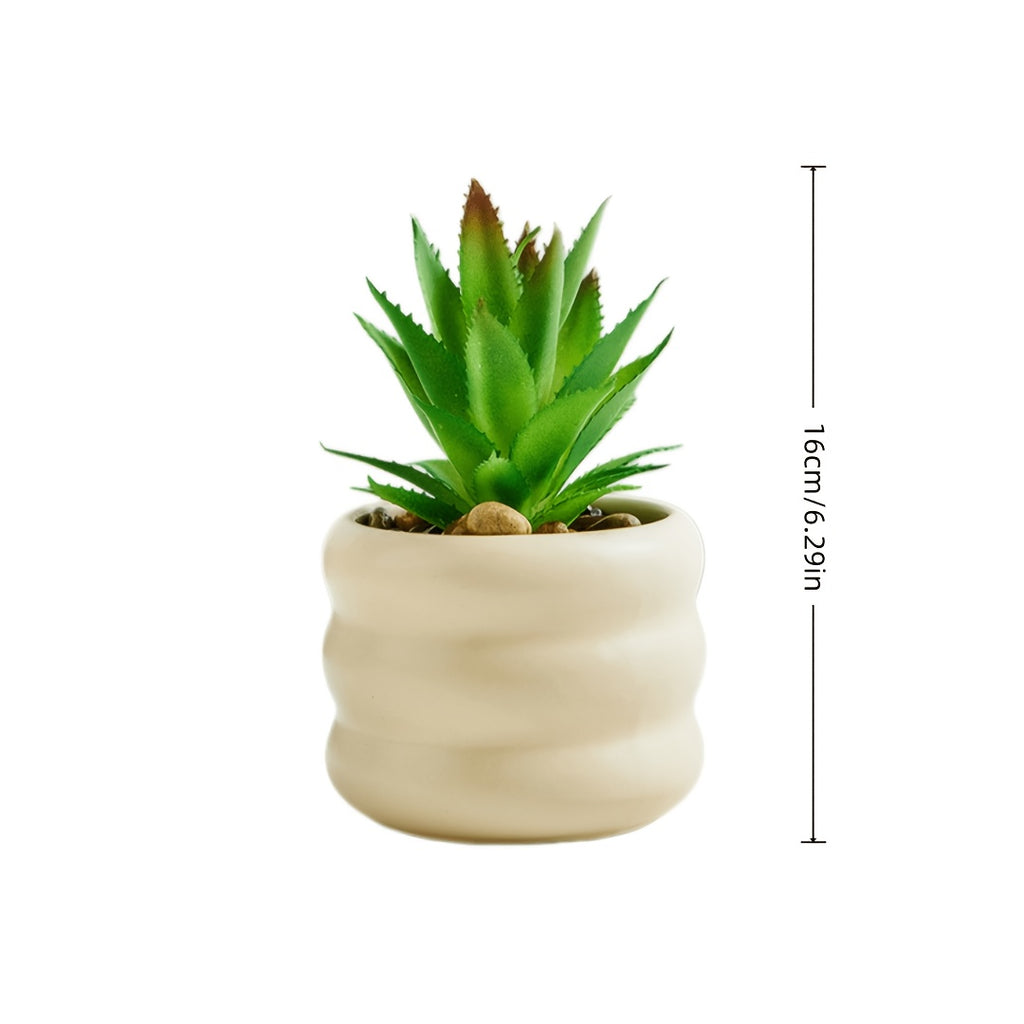 Petit cache-pot en céramique beige avec son aloès artificiel