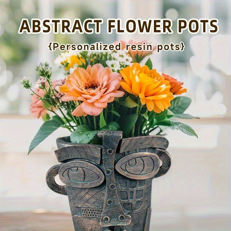 Pot de fleur design visage abstrait en résine effet bronze