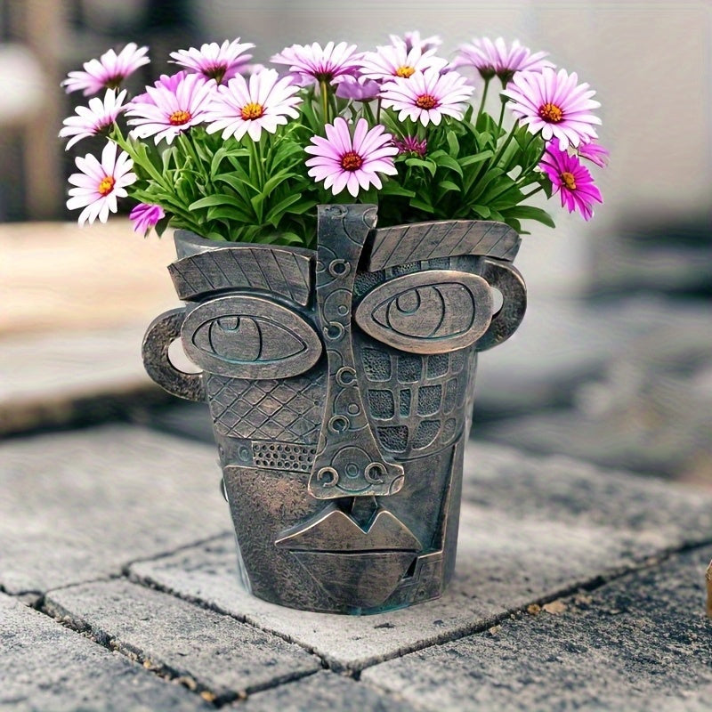 Pot de fleur design visage abstrait en résine effet bronze