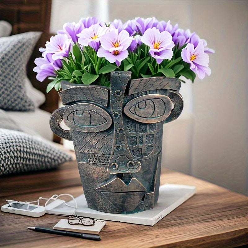 Pot de fleur design visage abstrait en résine effet bronze
