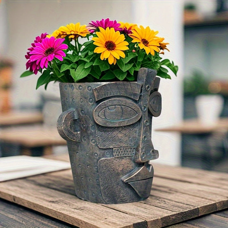 Pot de fleur design visage abstrait en résine effet bronze