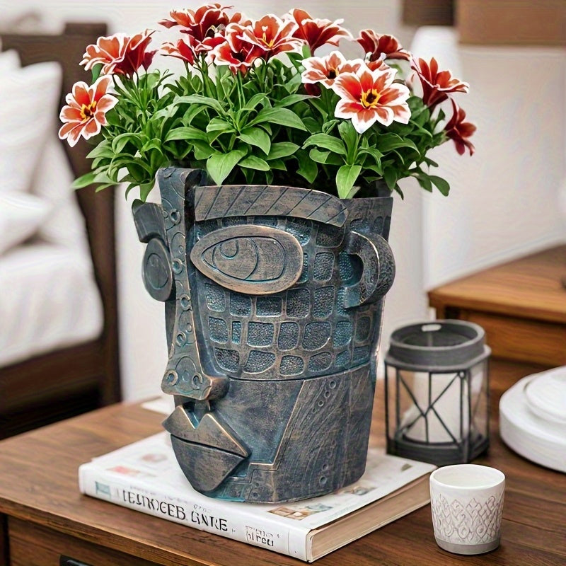 Pot de fleur design visage abstrait en résine effet bronze