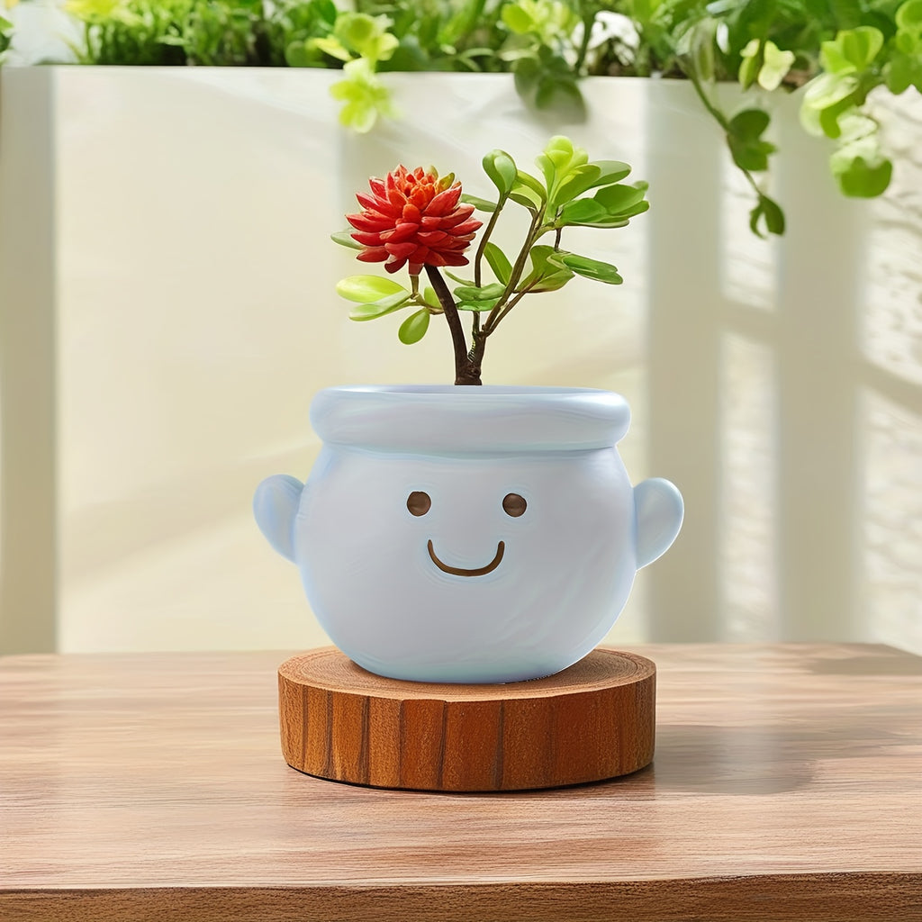 Pot de fleur extérieur en résine Ø 12 cm — visage souriant