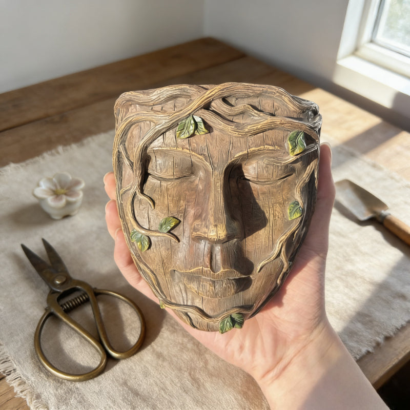 Pot de fleur mural visage sculpté en résine effet bois vieilli