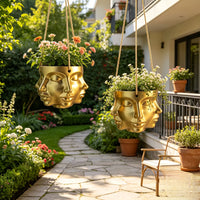 Pot de fleur suspendu doré à visages sculptés en résine Ø 15 cm