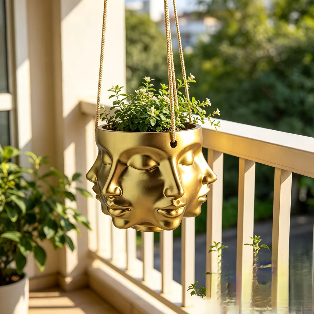 Pot de fleur suspendu doré à visages sculptés en résine Ø 15 cm
